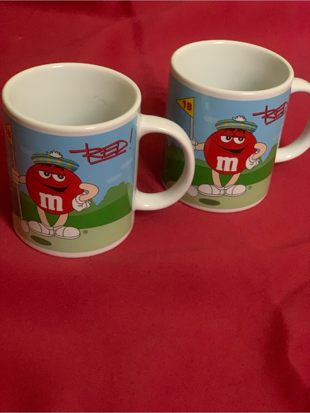 Vintage 2002 M&M Coffee Mug Blue Football (back) / Red Golfing (front)